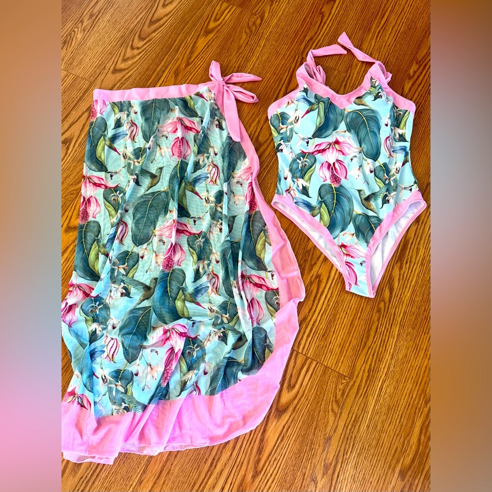 Woman’s size 12/Large Floral One Piece Bathing Suit With Full Length Sarong.